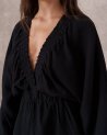 Robe noire à manches chauve-souris