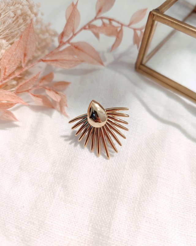 Bague demi-soleil en acier doré