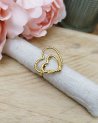 Bague à double coeurs entrelacés en acier doré