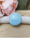 Grosse bague ronde bleue pailletée en acier