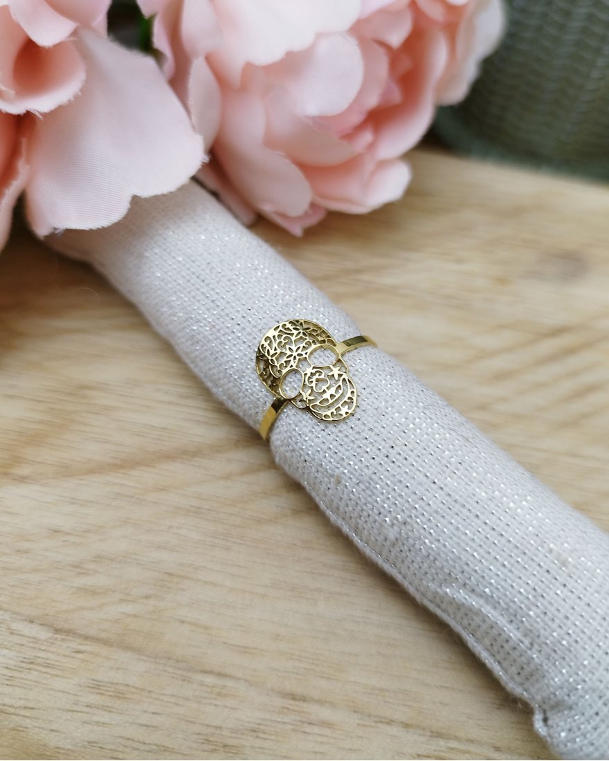 Bague tête de mort en acier doré