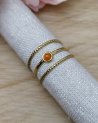 Bague dorée 3 rangs avec une petite pierre orange