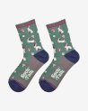 Chaussettes vertes avec des petits lapins blancs