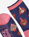 Chaussettes avec des petits chiens festifs