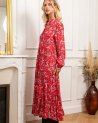 Longue robe rouge fluide à petites fleurs blanches