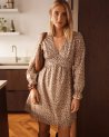 Robe courte beige imprimé fleuri