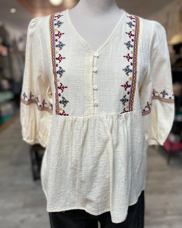 Blouse beige à broderie...