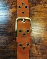 Ceinture à oeillets en cuir camel