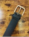 Ceinture à oeillets en cuir noir