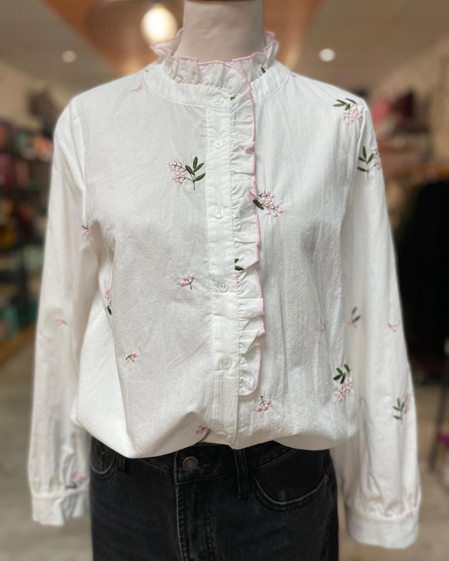 Chemisier blanc brodé de petites fleurs roses