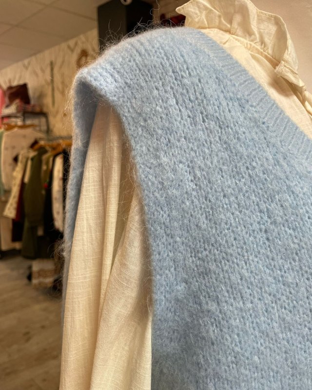 Pull sans manches à col V côtelé