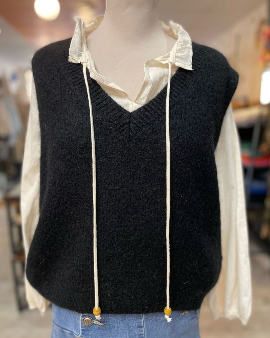 Pull sans manches à col V côtelé