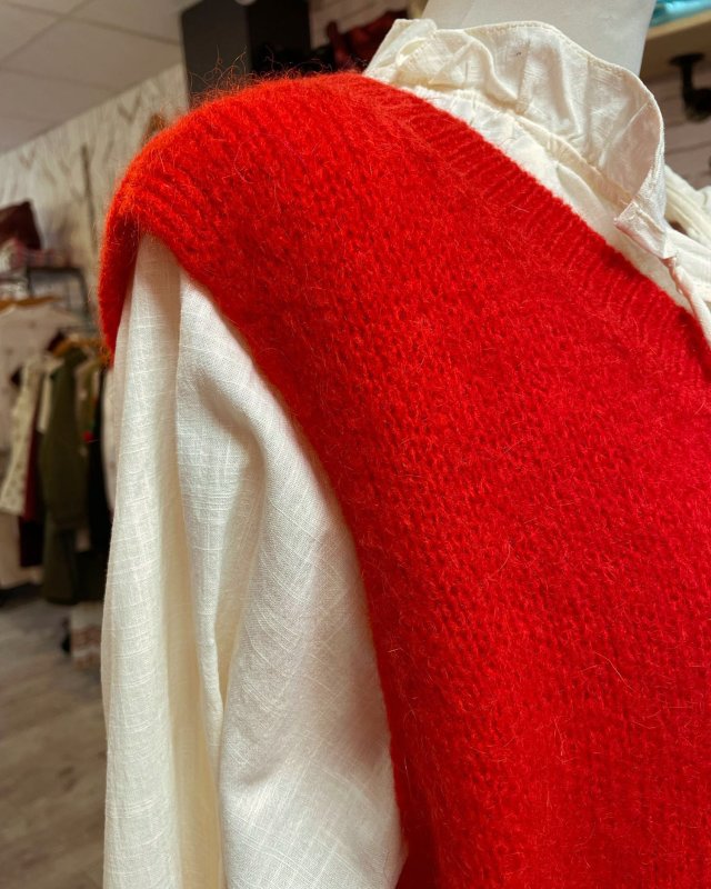 Pull sans manches à col V côtelé