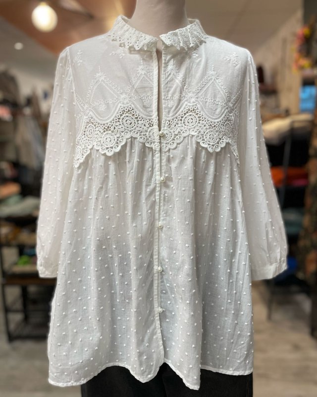 Chemisier blanc à plumetis...