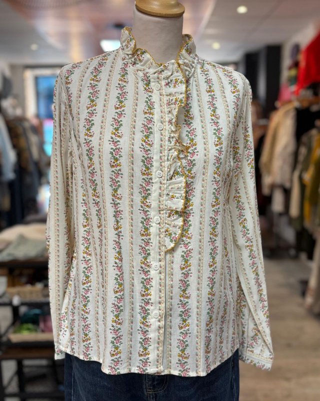 Chemisier fleuri à rayures...