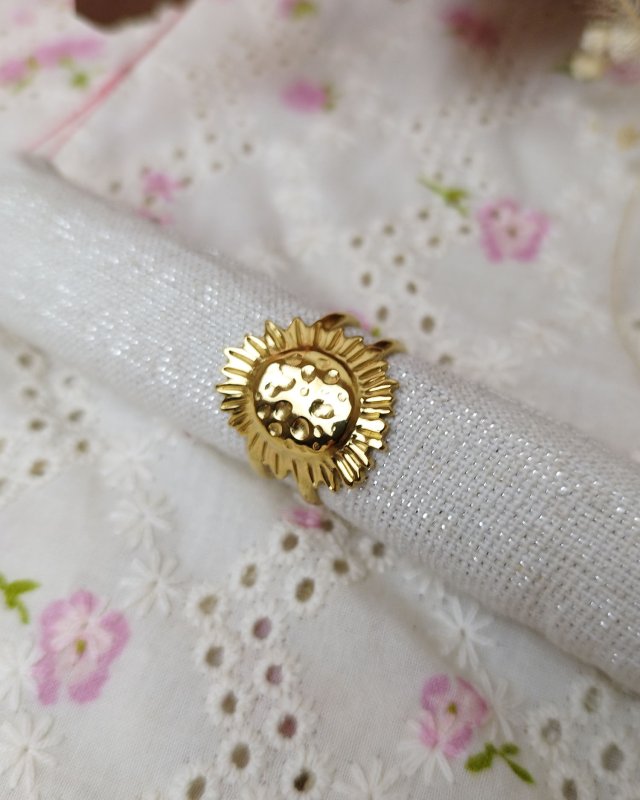 Bague tournesol en acier...