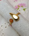 Bague goutte dorée avec une pierre orange