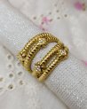 Bague multi-anneaux dorée avec des strass