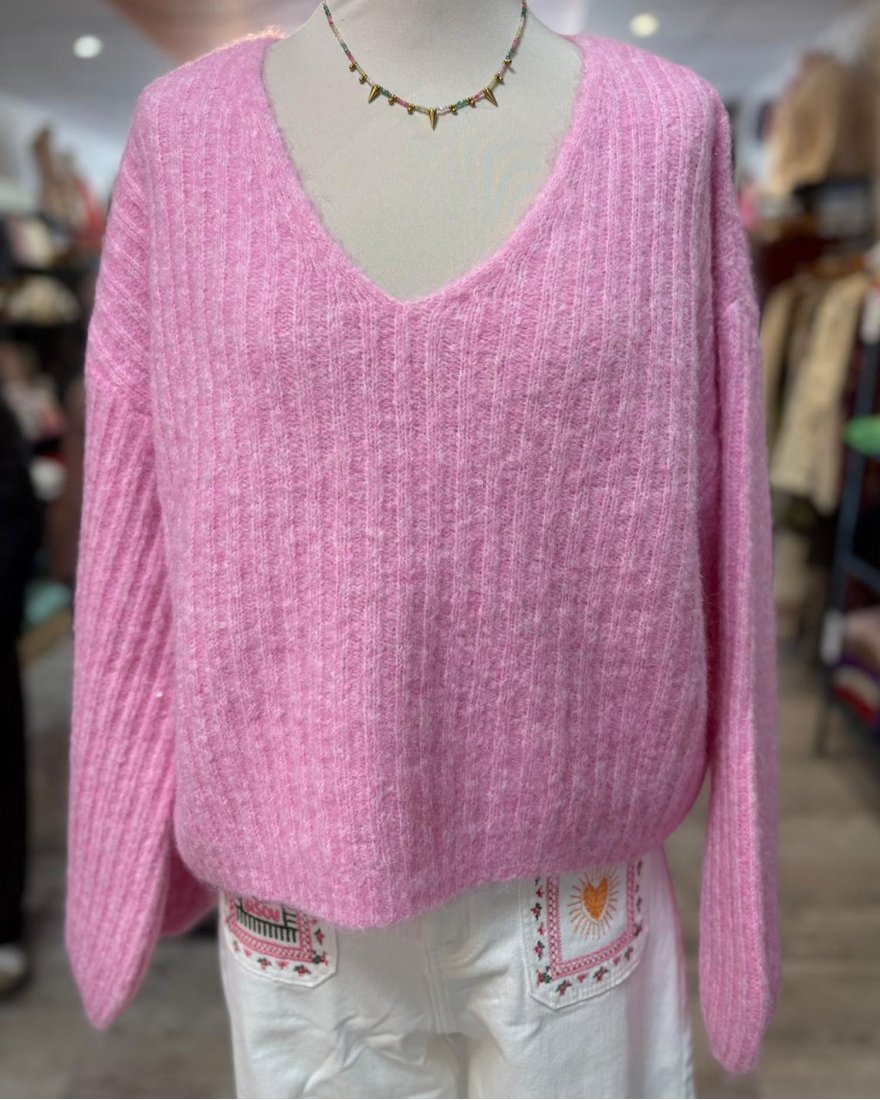 Pull court rose en maille côtelée