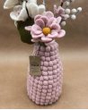 Vase boule rose clair en laine feutrée