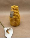 Vase boule jaune moutarde en laine feutrée