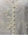 Blouse écrue en broderie anglaise festonnée