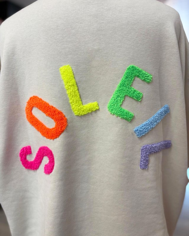 Sweat beige à message Soleil multicolore
