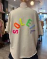 Sweat beige à message Soleil multicolore