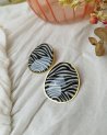 Boucles d'oreilles oversize à motif zébré