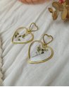 Boucles d'oreilles coeurs transparents et fleurs séchées
