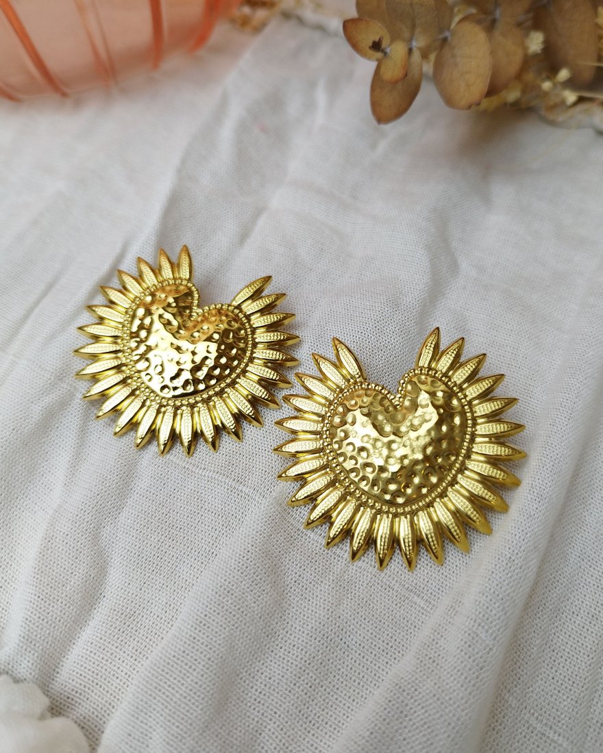 Boucles d'oreilles soleil doré au centre texturé