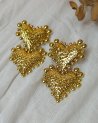 Boucles d'oreilles dorées à doubles coeurs effet granit
