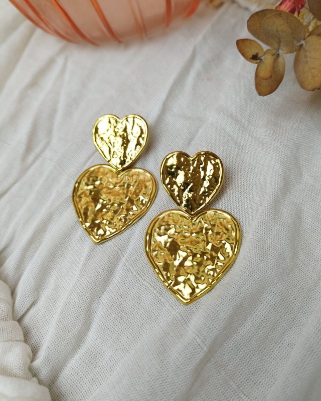 Boucles d'oreilles à deux coeurs en acier doré