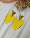 Boucles d'oreilles à coeurs jaunes et dorés
