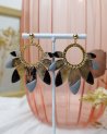 Boucles d'oreilles rondes à pétales noires et dorées