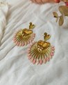 Boucles d'oreilles coeur à rayon de soleil rose