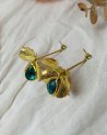 Boucles d'oreilles pendantes fleur dorée et goutte turquoise