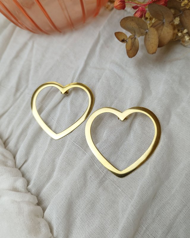 Grandes boucles d'oreilles...