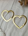 Grandes boucles d'oreilles dorées en forme de coeur