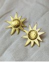 Boucles d'oreilles petit soleil en acier doré