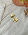 Boucles d'oreilles petit soleil en acier doré