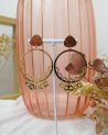 Boucles d'oreilles créoles avec des pampilles étoilées