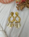 Boucles d'oreilles XXL à longues pampilles dorées