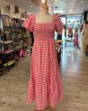Robe longue en vichy rouge avec un buste smocké