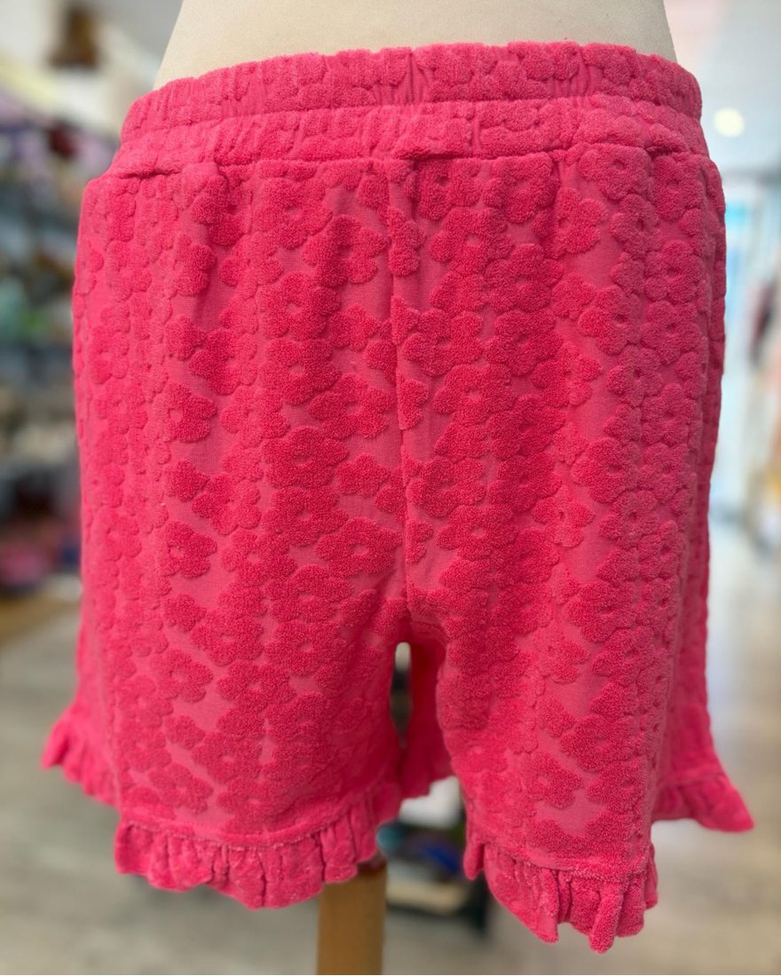Short en éponge fuchsia à motif fleuri