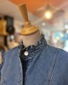 Veste sans manches en jean avec des petits volants