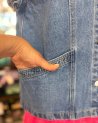 Veste sans manches en jean avec des petits volants