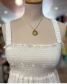 Top smocké blanc à broderie anglaise fleurie