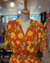 Longue robe orange à imprimé agrumes