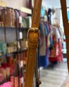 Petit sac en cuir avec une bandoulière en cuir et maillons dorés